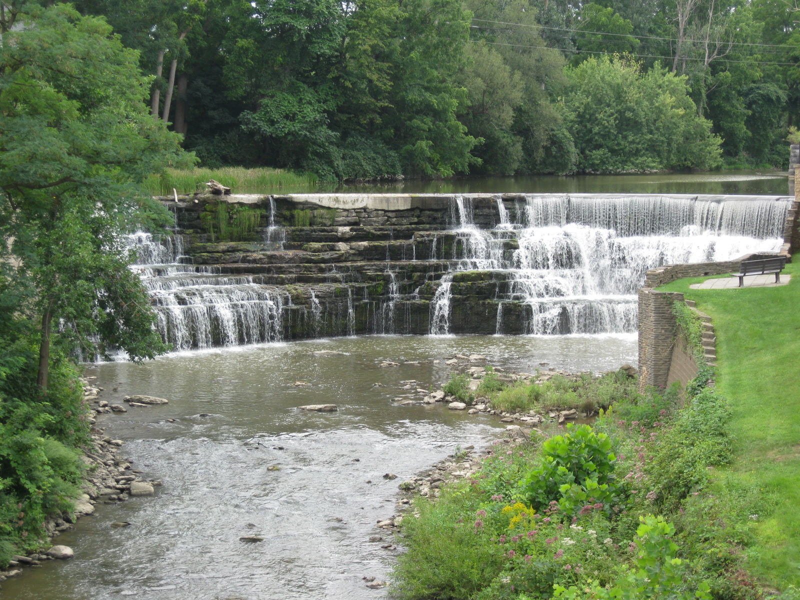 You'll see waterfalls when you hike Honeoye Lake. Hiking to Honeoye Falls on Honeoye Lake. Photo credit: Doug Kerr.