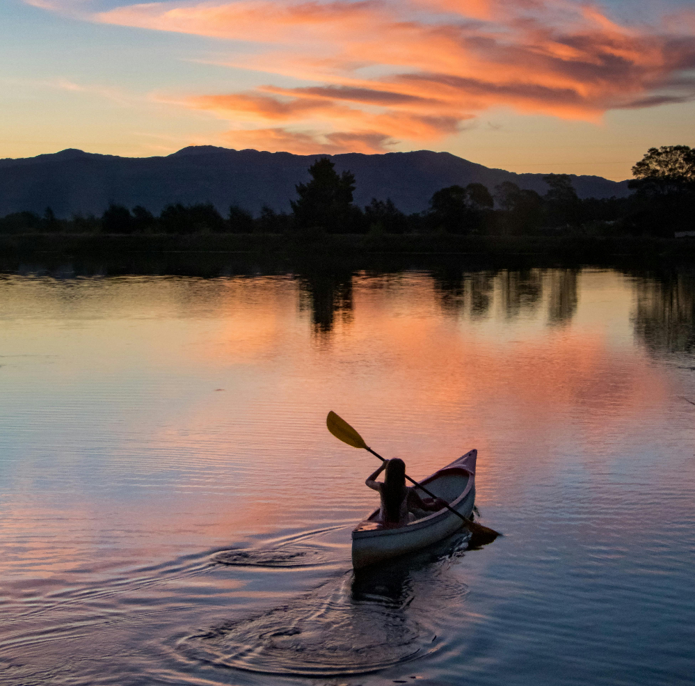 Paddling Honeoye Lake at sunset. Paddling at sunset